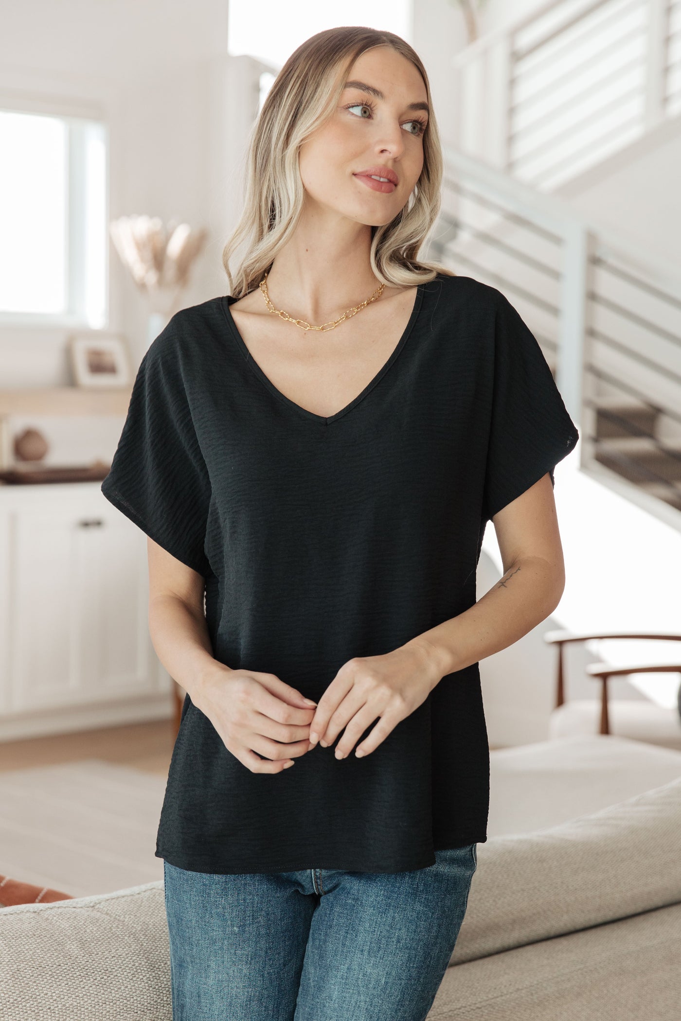 Frequently Asked Questions V-Neck Top in Black Womens Southern Soul Collectives